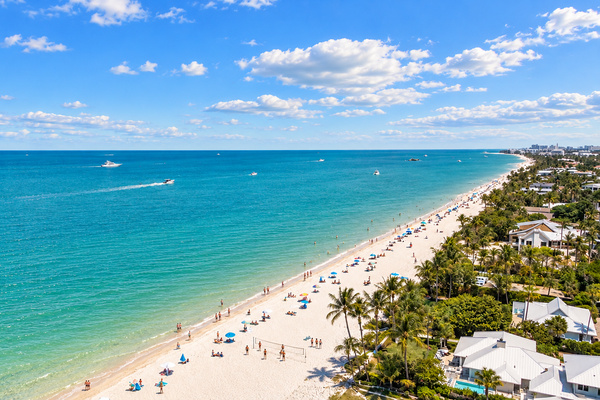 Naples’ powder-white Gulf shoreline, just a short walk from La Côte Naples.