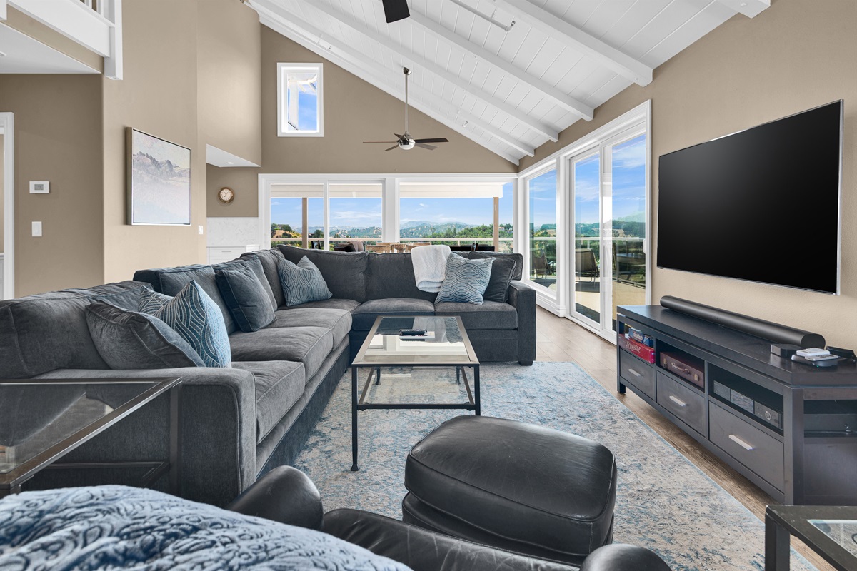 Comfortable living area with windows to take in the view from indoors as well.