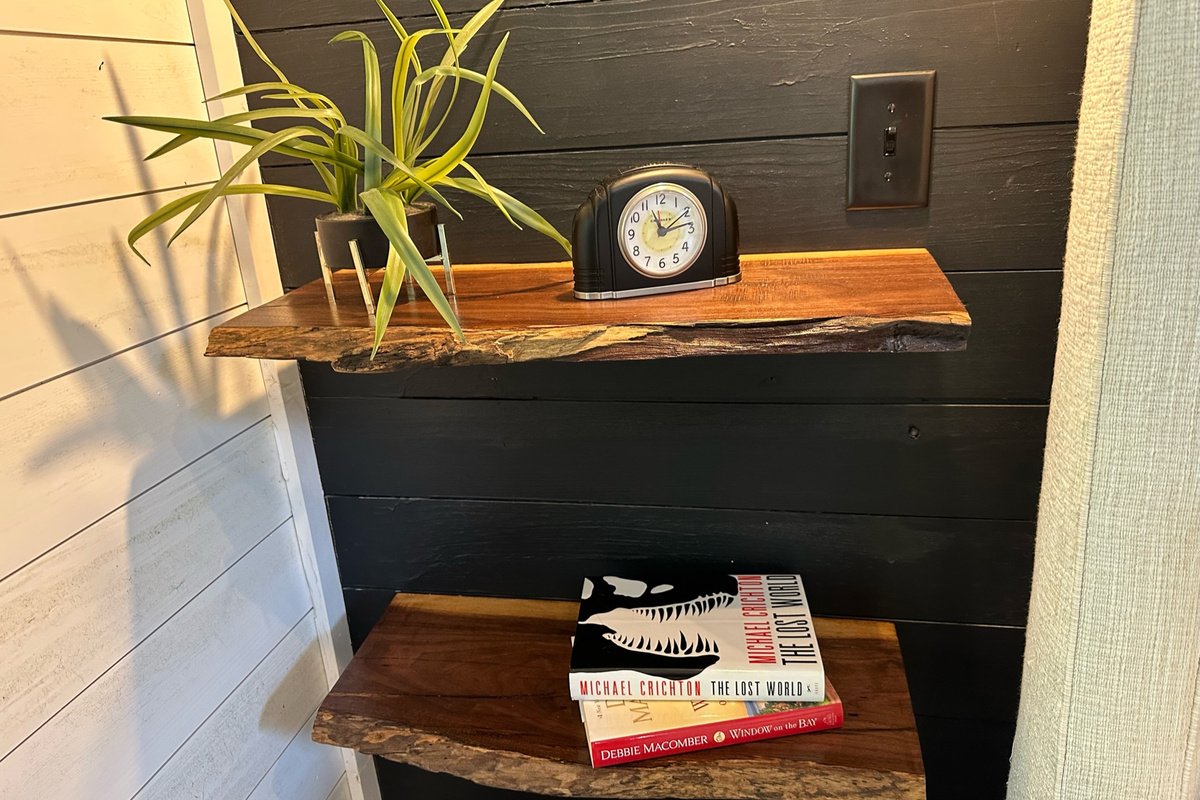 Hand crafted Live Edge Black Walnut night stand shelves in the master bedroom!