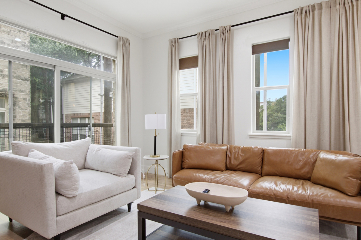 Spacious seating with sunlit views, perfect for relaxation or gathering!