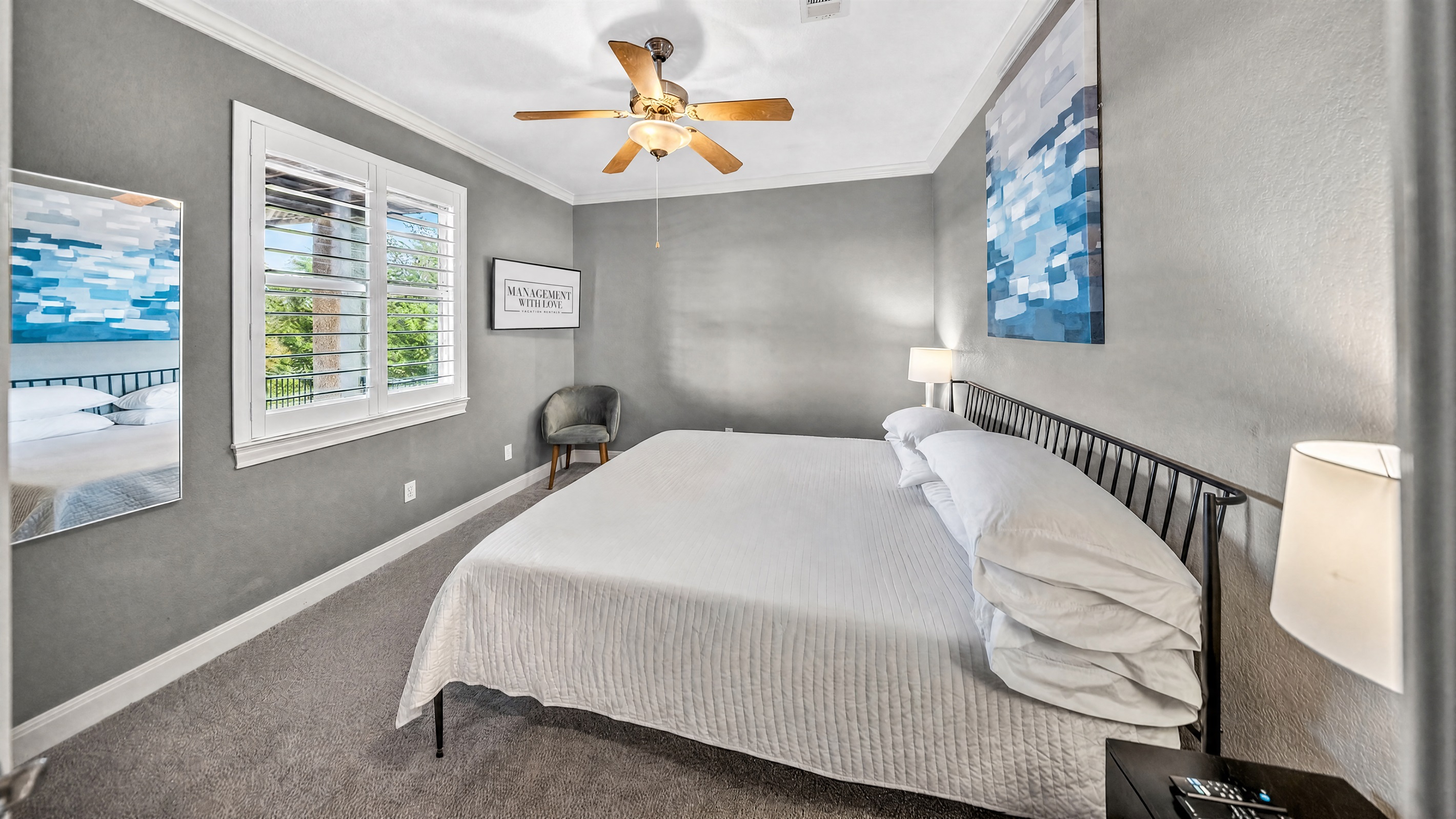 Second downstairs king bedroom offering the same comfort and layout, with a 42 inch TV and ample storage. Clean, simple, and designed for a restful stay.
