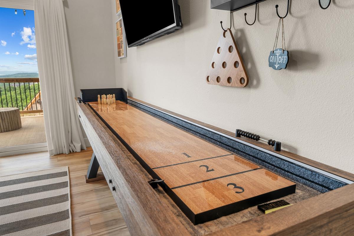2-in-1 shuffle board game with bowling pins