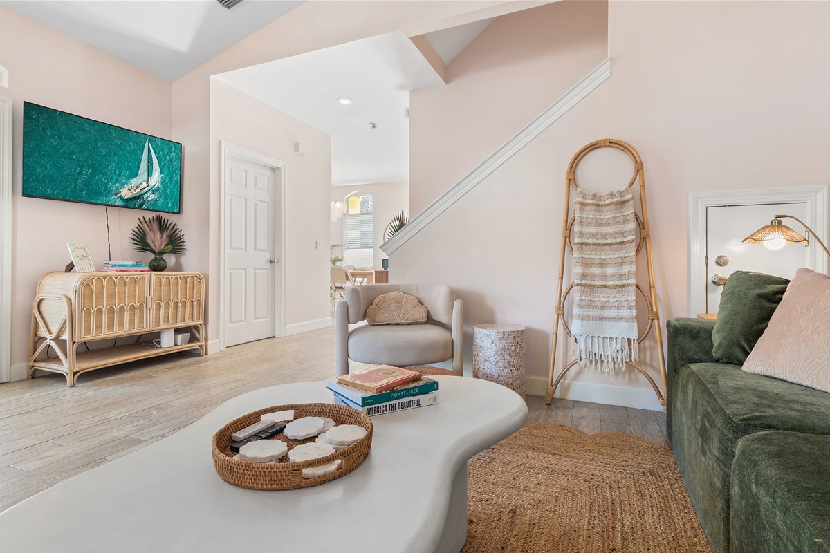 1st Floor Living Space with Smart TV, Arcade Game, New Furniture, Full Bathroom, Appealing Decor, Patio Access, open to the Kitchen and Dining Room