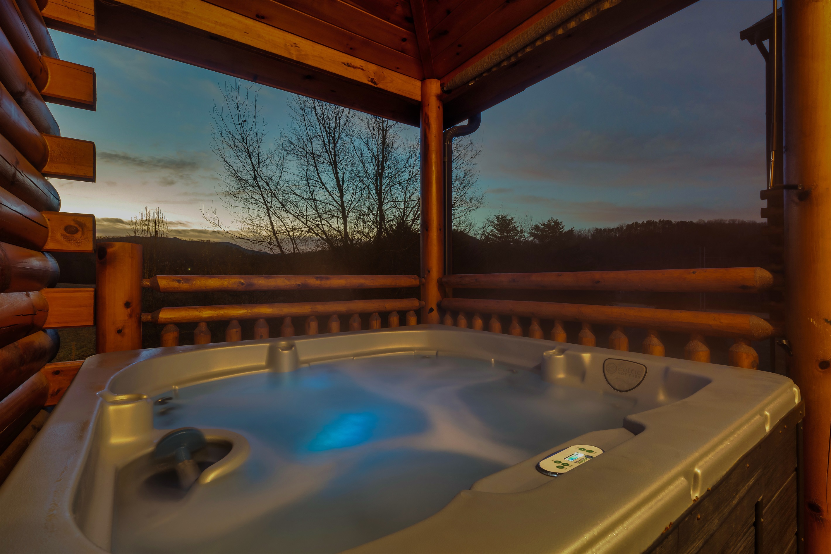 Hot Tub Oasis: Relax in the bubbling warmth while soaking in breathtaking mountain views!