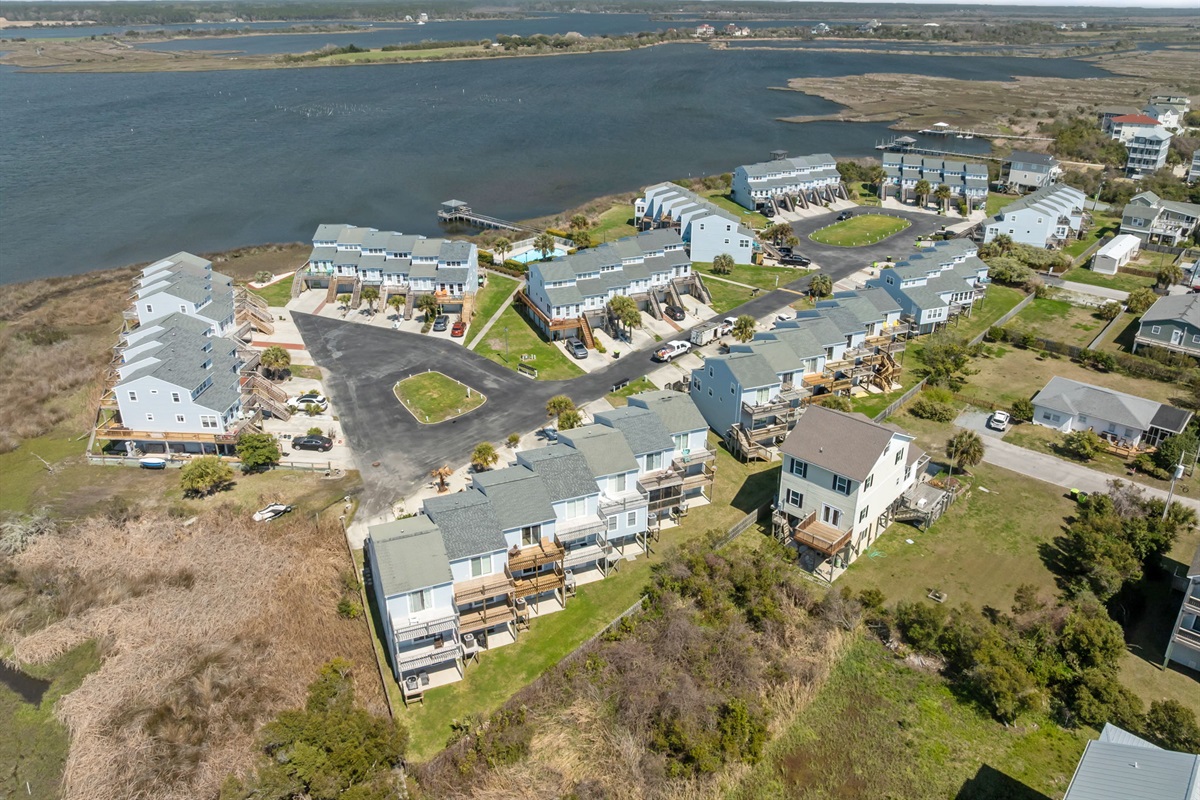 Aerial overview of Bermuda Landing community near the ocean