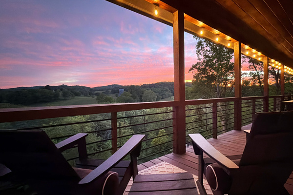 Just outside of the master bedroom, on the upper deck, are two comfortable Polywood rocking chairs with lumbar pillows. The perfect spot to sip a morning cappuccino or relax and watch the sunset while taking in the view.
