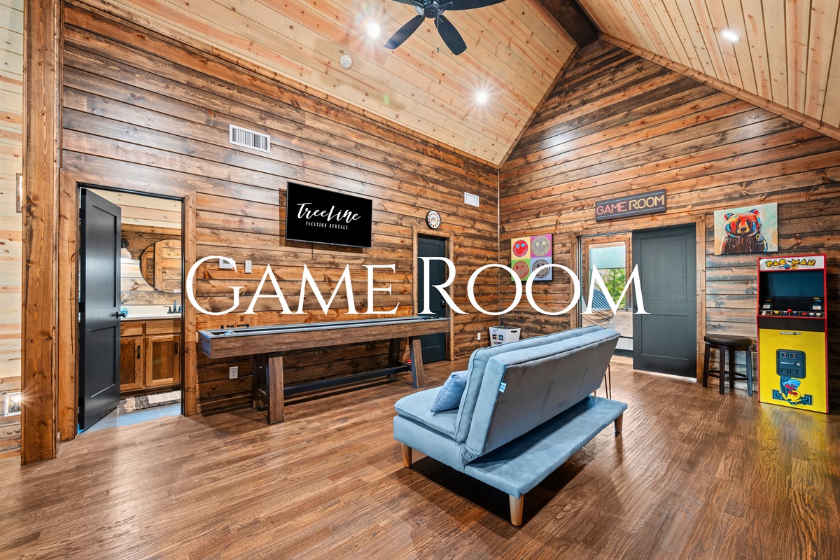 Upstairs, the game room is ready for fun, whether you’re playing, relaxing, or just enjoying a change of scenery from the main living area.