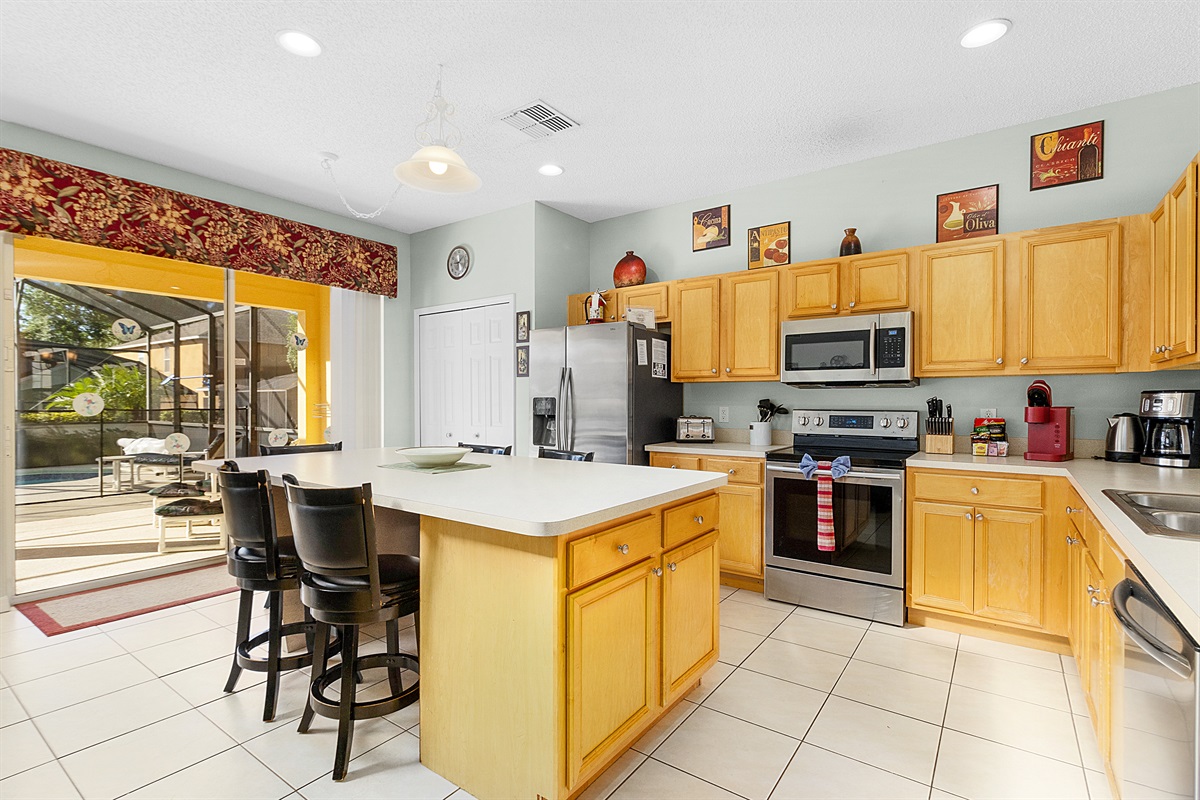 The kitchen island has seating for six.