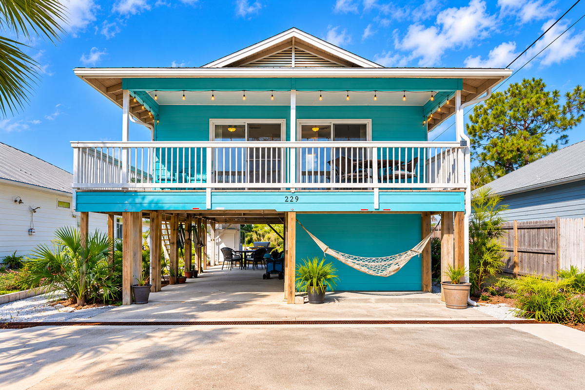 Escape to a world of seaside charm and cozy elegance at this enchanting Florida cottage, where sunny days and balmy nights are always in season 
