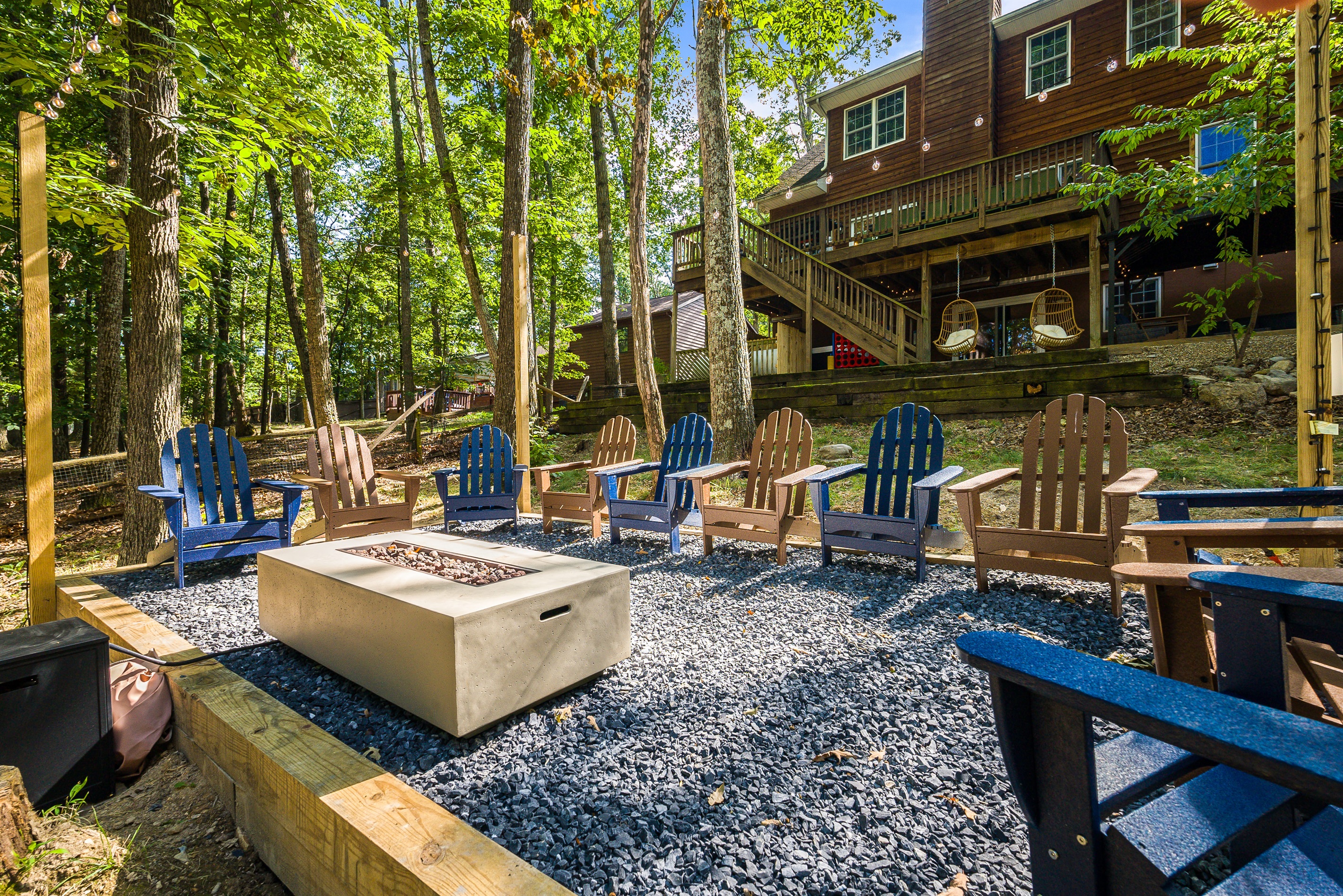 Gather ‘round the fire pit under string lights for s’mores, stories, and stargazing