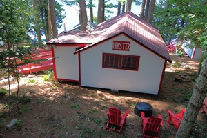 Back side of the cabin with lobster sign