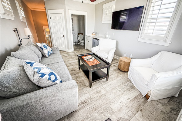 Third floor loft / game room / extra bedroom with attached 1/2 bath and wet bar