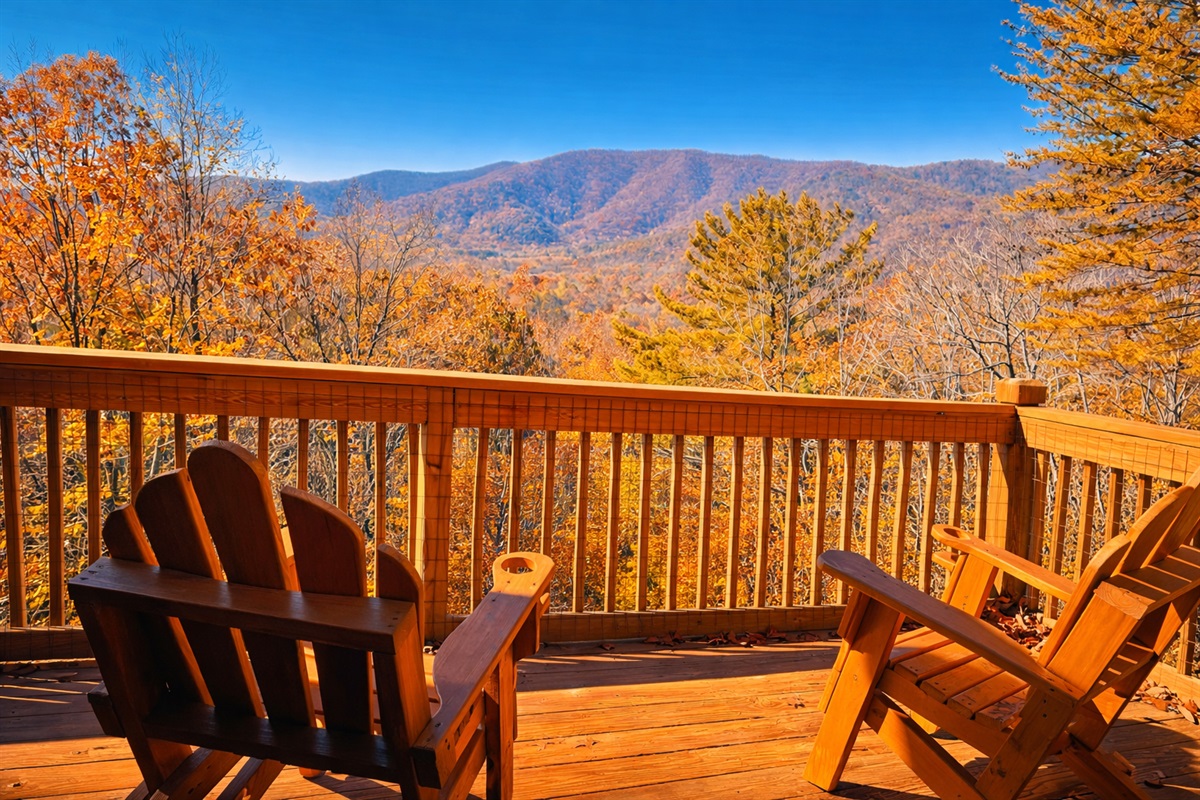 Unwind in Adirondack chairs with sweeping mountain views—your perfect spot for morning coffee, sunset skies, and peaceful cabin moments.
