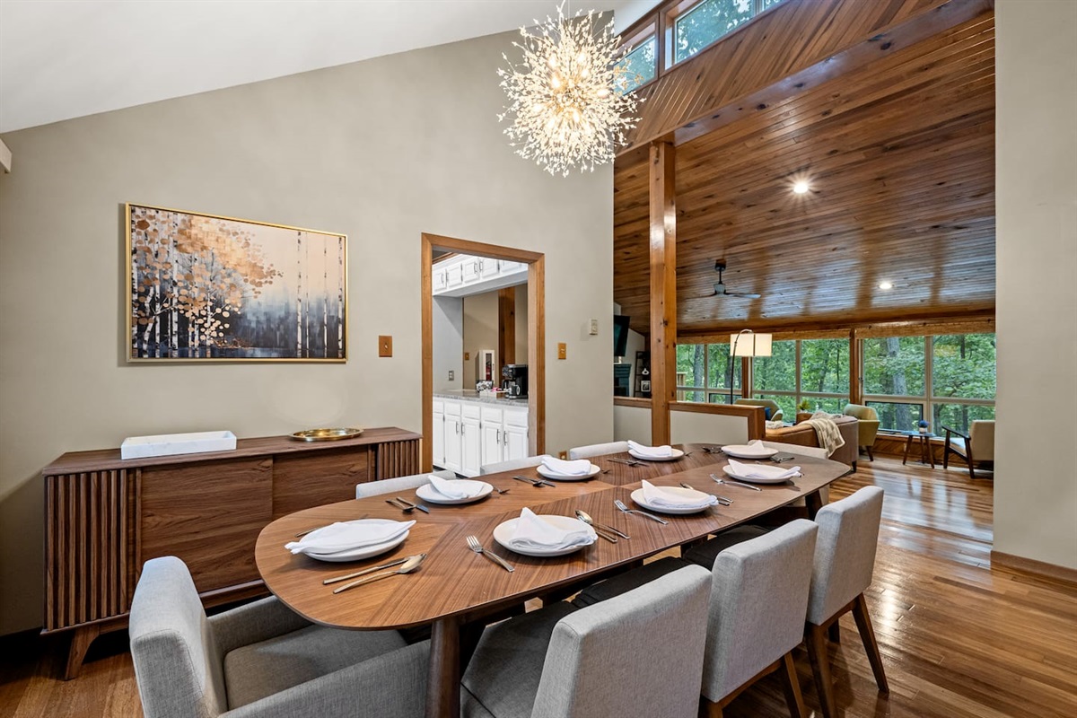 Seating for eight at the dinner table.  24 sets of flatware and dishes for larger groups.