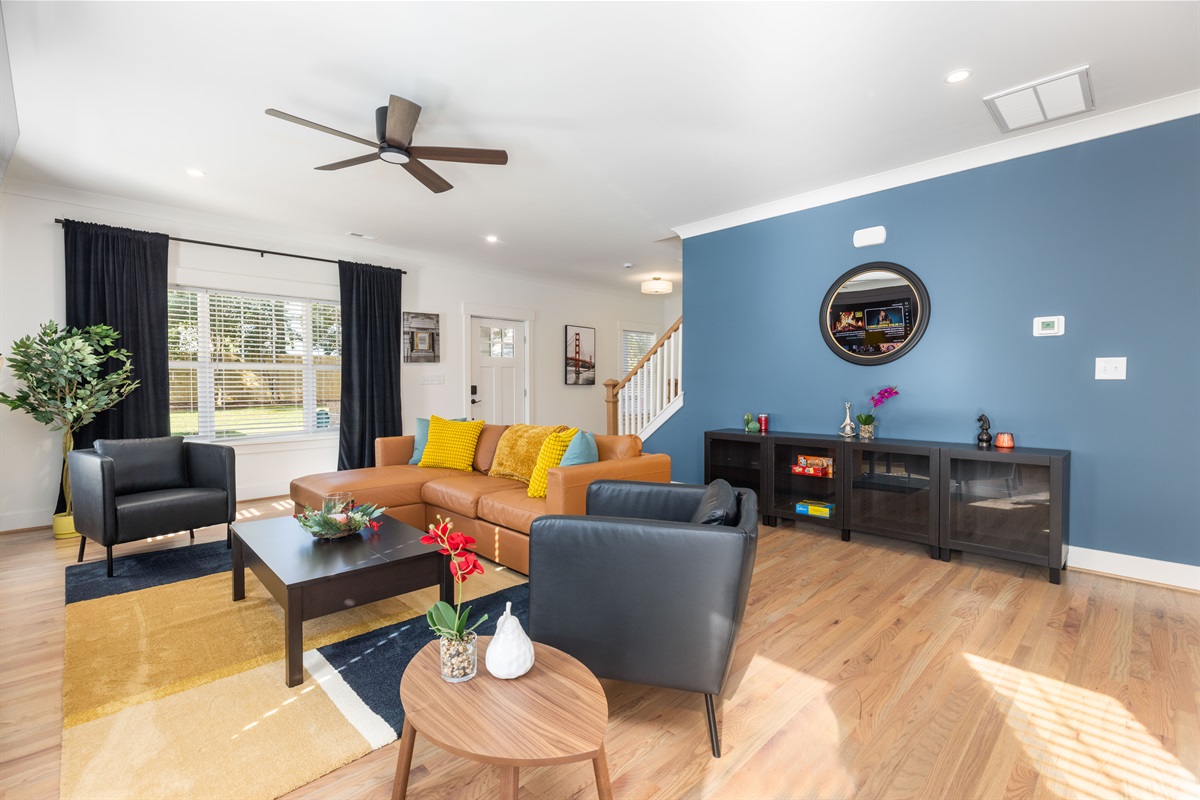 A splash of color brings a home to life. Plenty of comfortable seating for your whole group, making this the perfect queen city getaway! 