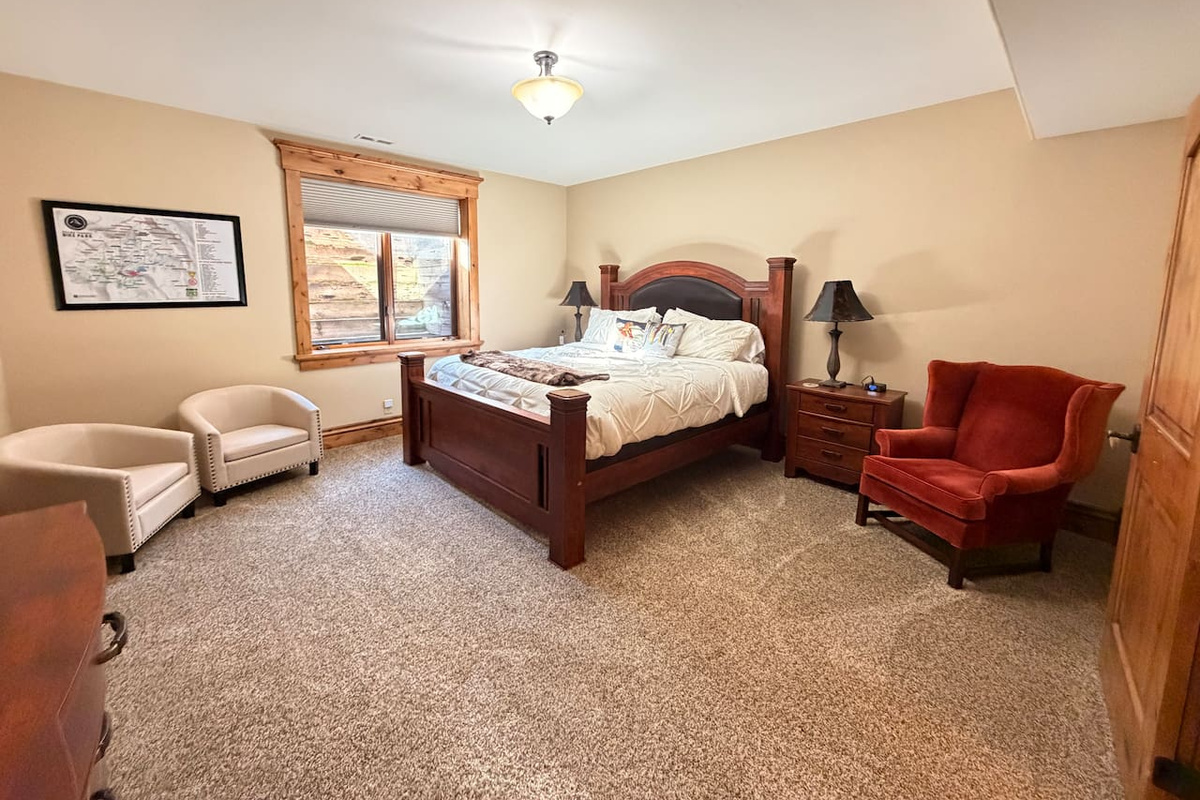 Our bedrooms are designed with comfort and relaxation in mind, featuring soothing décor and a cozy atmosphere to help you recharge after a day of adventure. Bedroom 3 boasts a king bed on the lower level, with easy access to the nearby bathroom