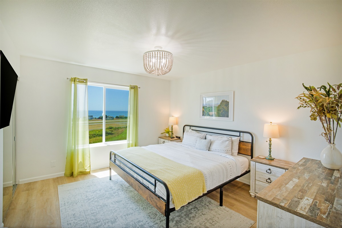 Large bedroom of Unit 2 with king bed.