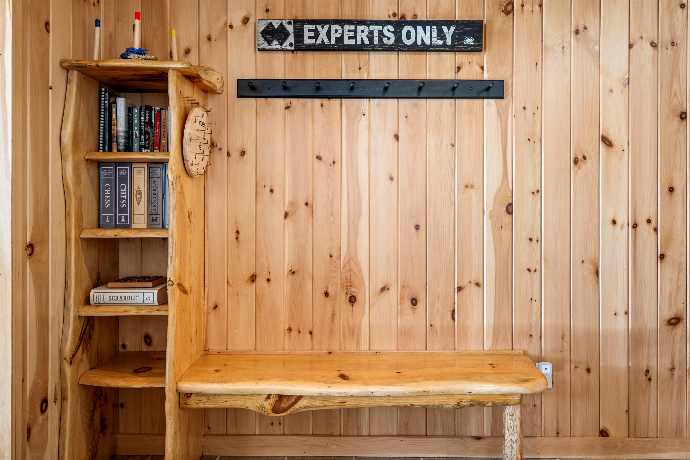Cozy book corner with space for your coats and extra belongings.