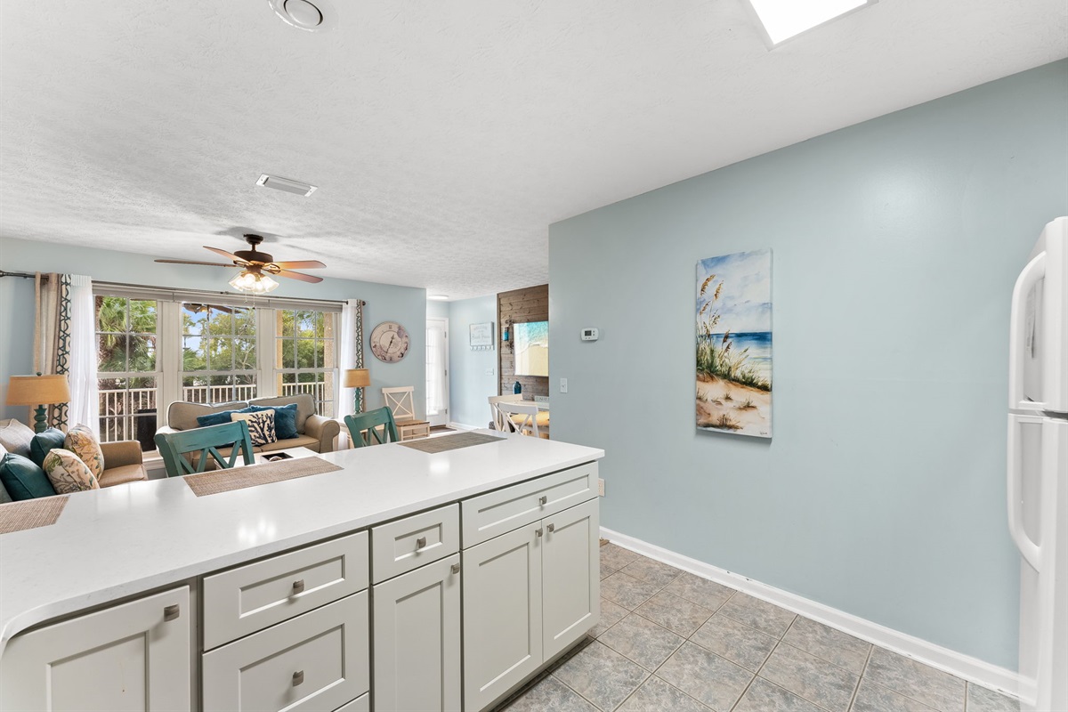 Fully refreshed kitchen with brand-new cabinets and stocked kitchen with tons of cooking utensils, cookware, and everything you need to prepare meals.
