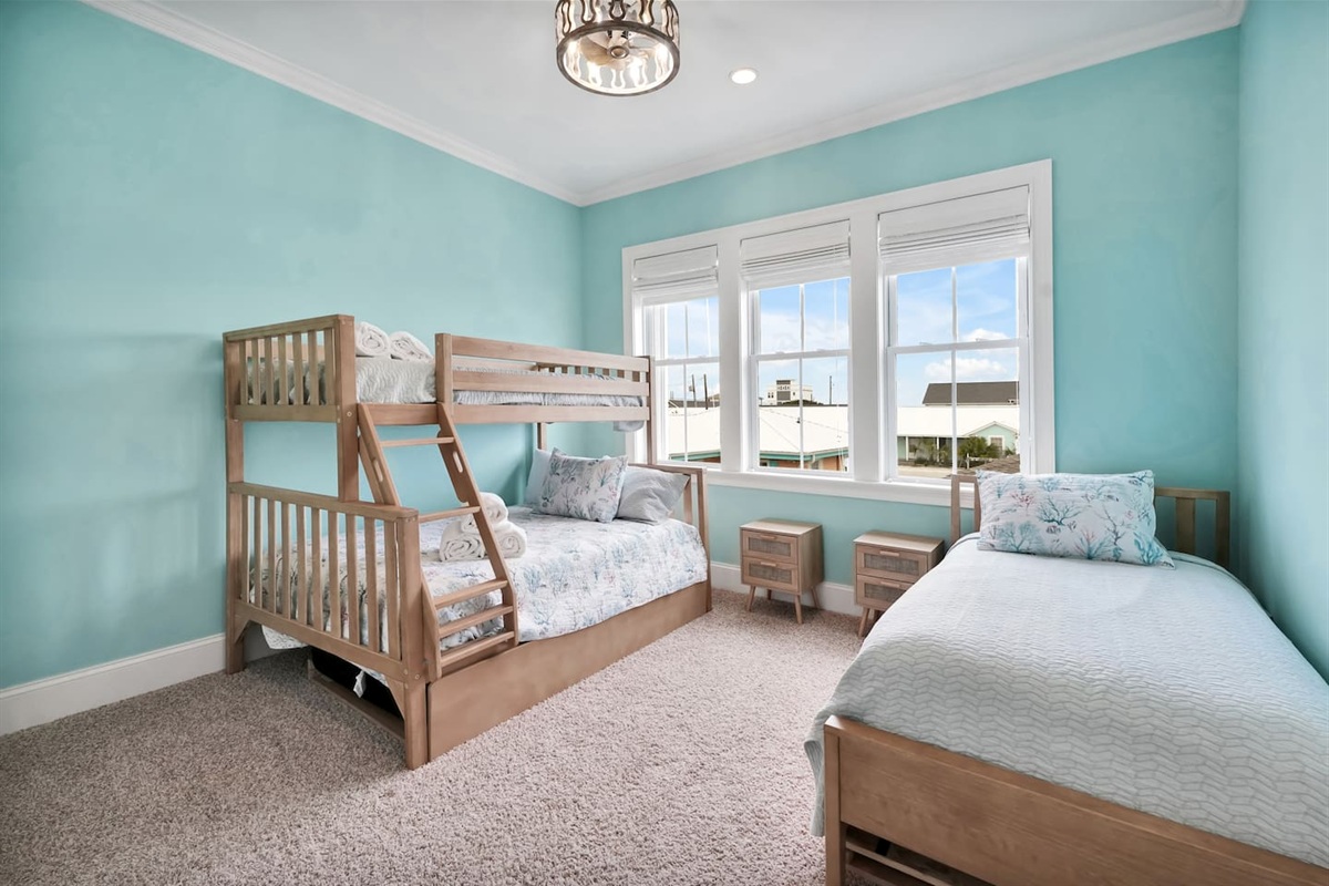 The bunk bed is a twin over a double