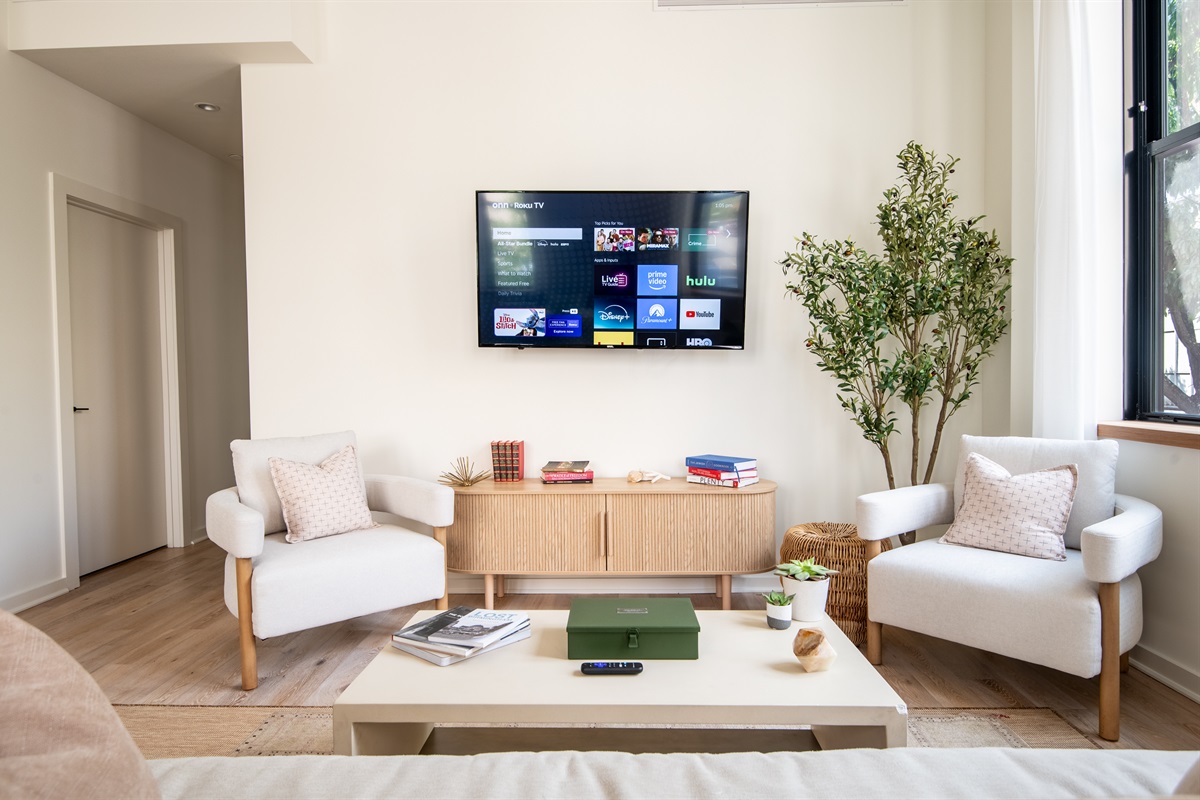 Cozy lounge with smart TV and comfortable seating