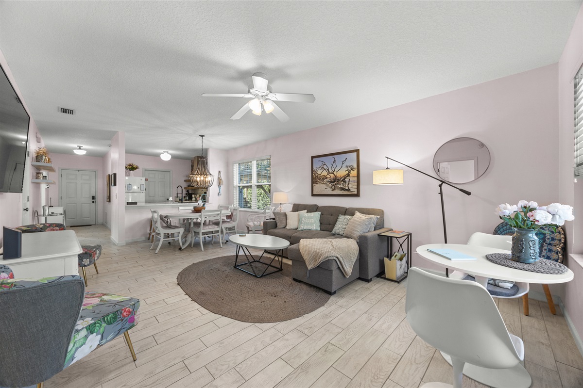 Cozy living area with modern décor and a spacious layout ideal for gathering with family and friends.
