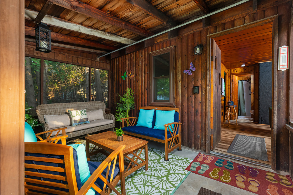 The screened in porch where you relax and listen to the morning loons sing