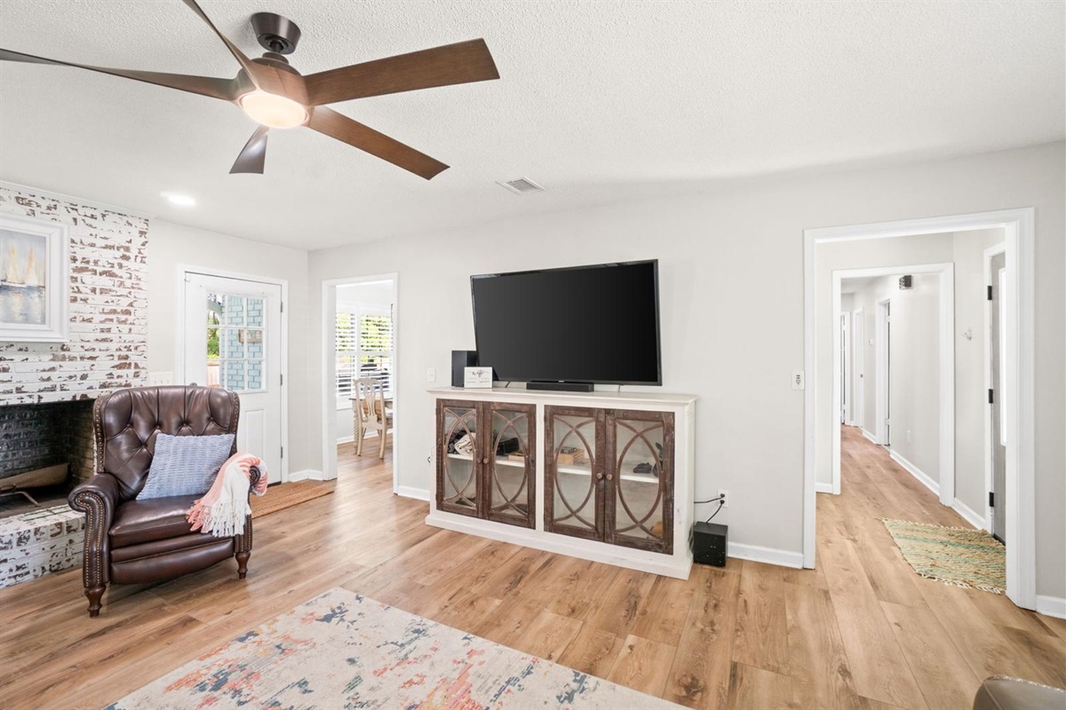 Spacious living area with smart TV
