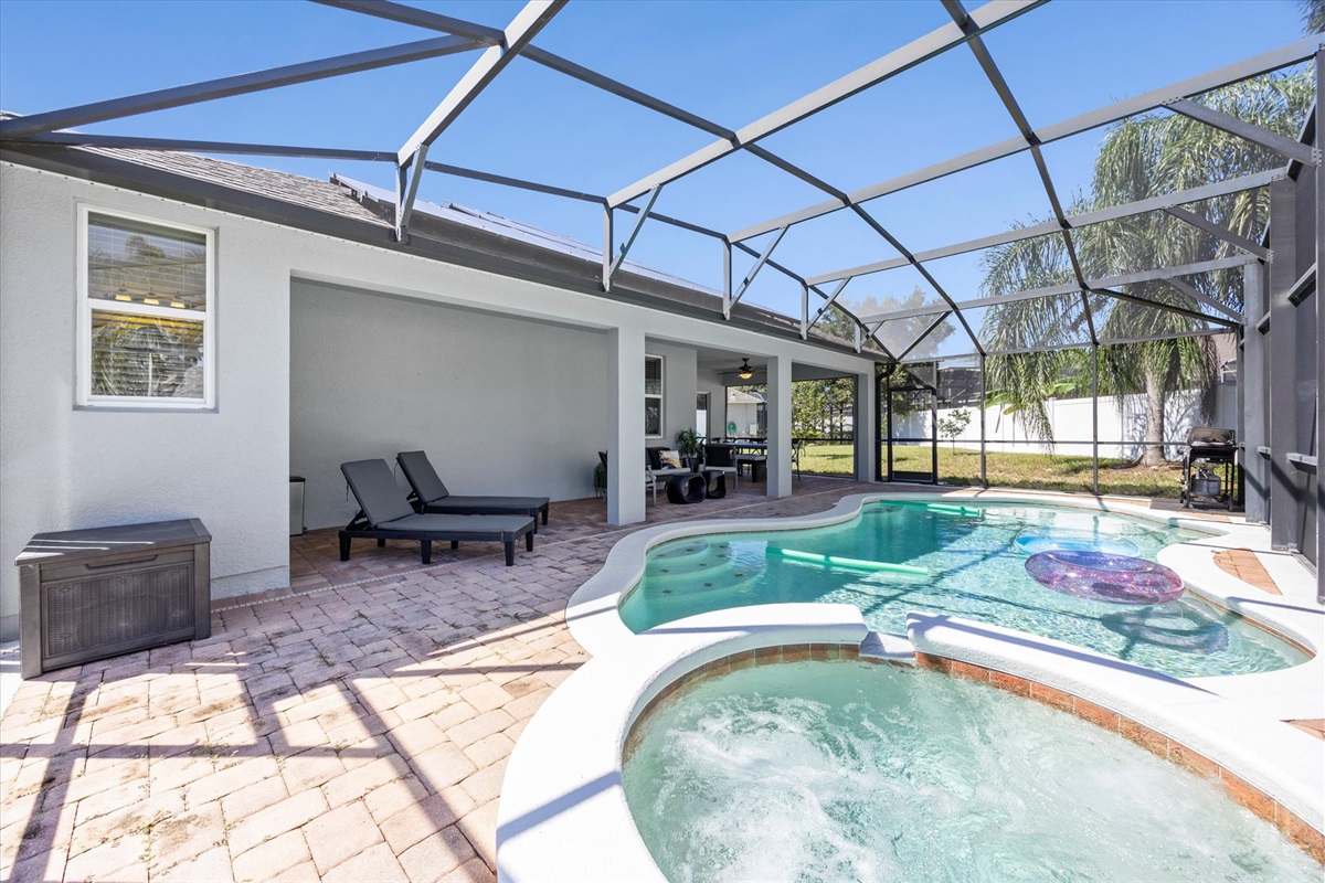 Spacious patio with loungers, dining area, and poolside views — everything you need for ultimate relaxation and fun in the sun.