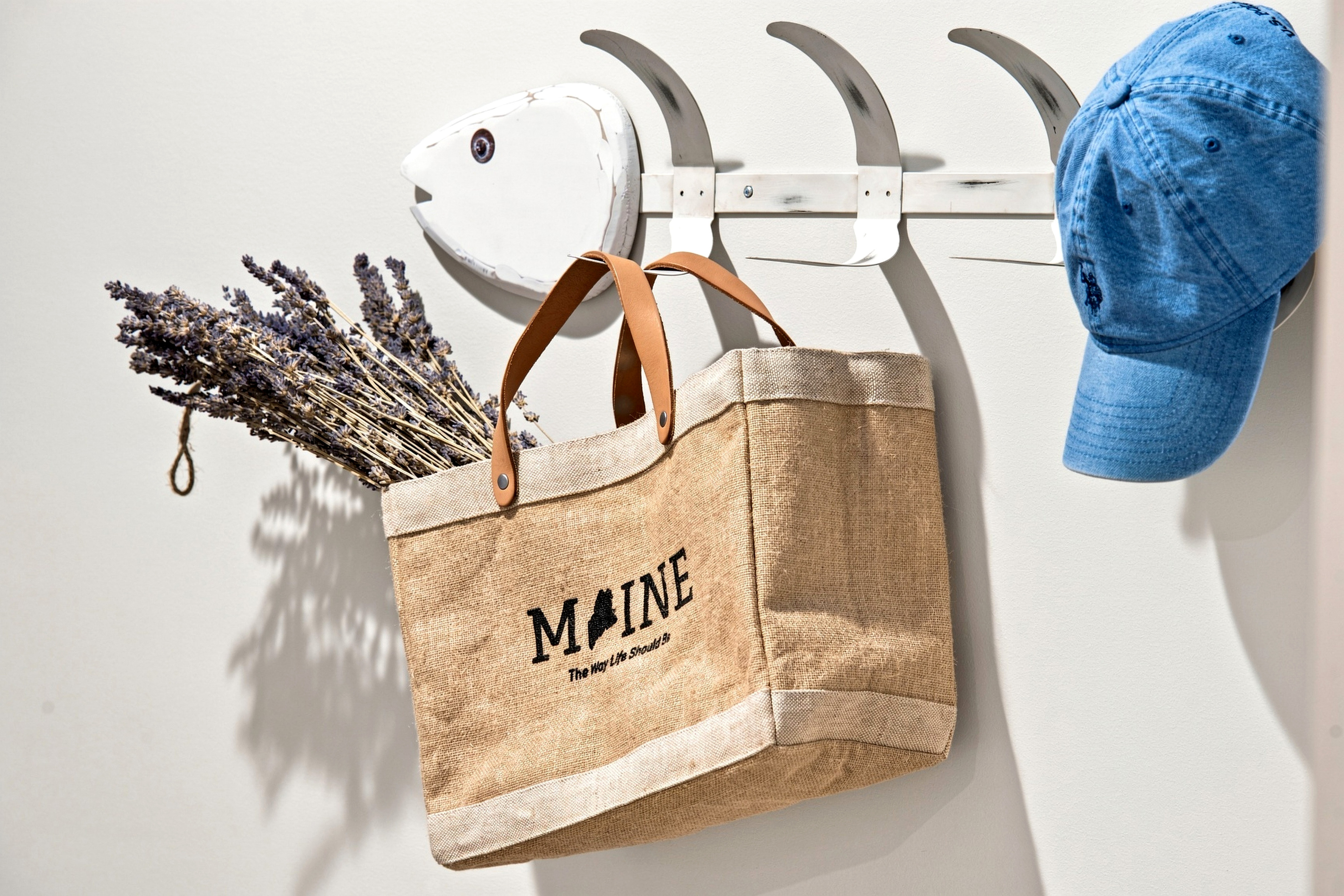 Charming Maine-inspired details bring a playful touch of coastal character to the home.