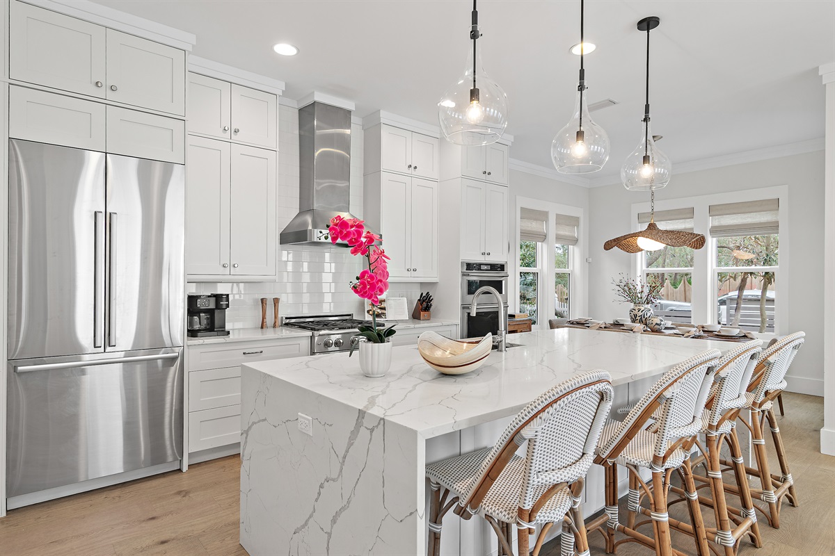 The well appointed kitchen offers a gas range, microwave and oven, full size fridge/freezer, large pantry, and a Keurig and Nespresso machine.