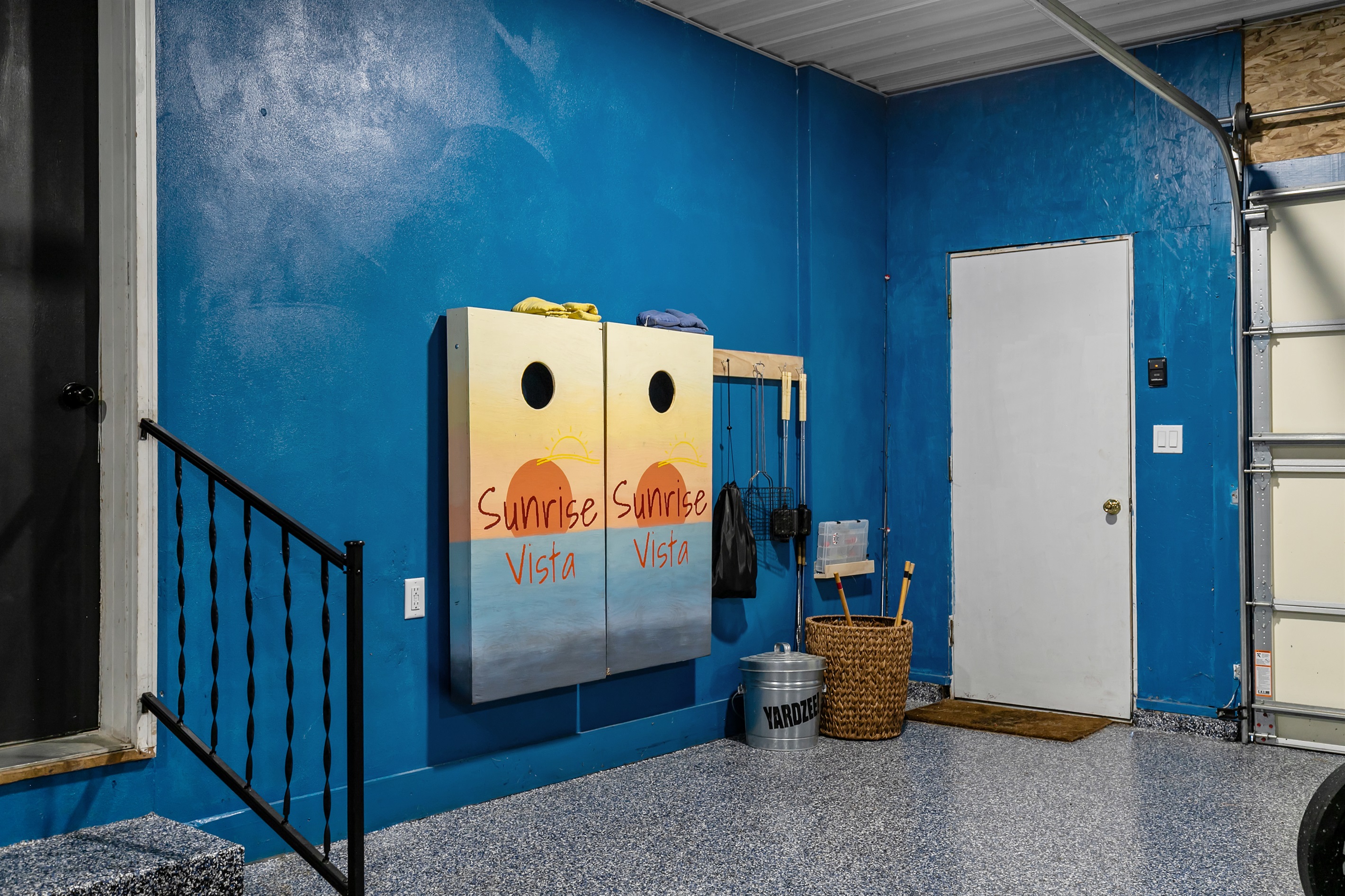 Marshmallow sticks and pudgy pie makers are neatly stored for easy use around the fire.