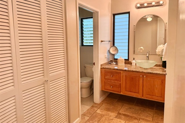Main Bathroom - features a walk-in shower, vanity, fresh towels and extra storage for your convenience