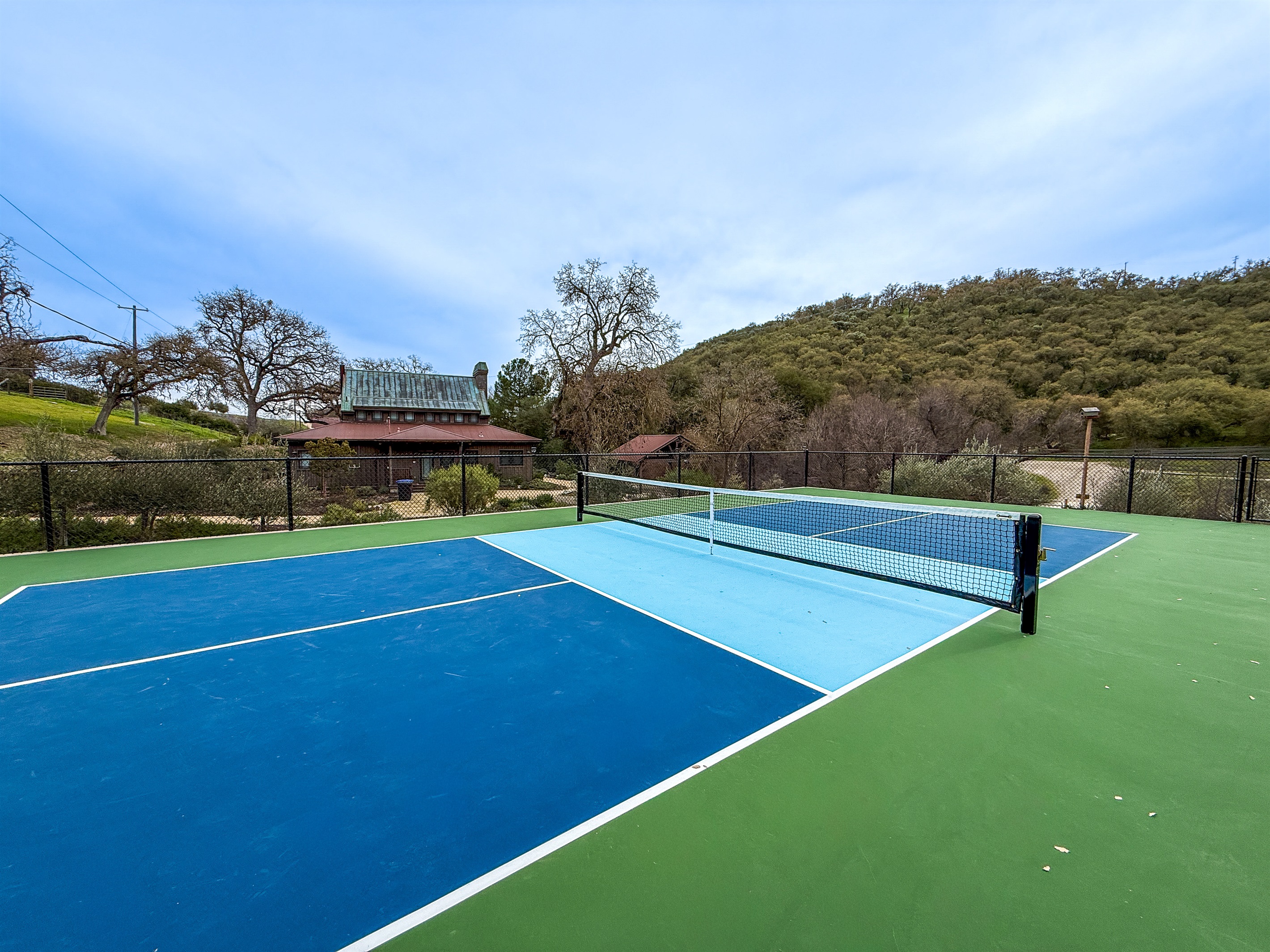The private pickle ball court at Oaks & Madeira