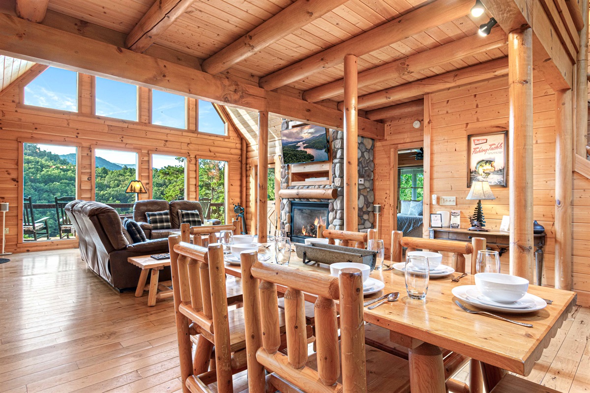 Main Level Dining Room: Delight in mountain views while savoring meals around a rustic, handcrafted table!