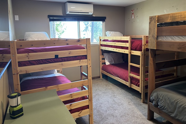 Bunk room - two twin bunks, 1 full size bunk(total of 6 beds) and 50” smart TV. 