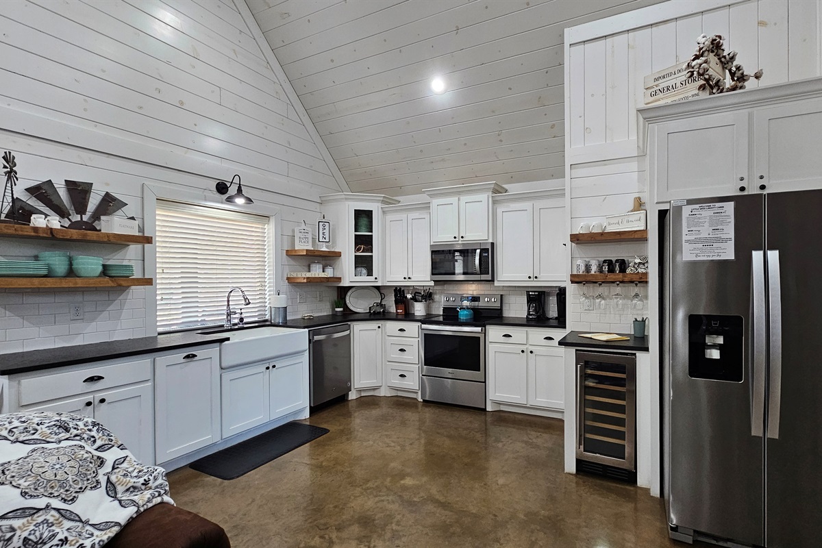 Kitchen: Stylish and functional space, perfect for culinary adventures and gathering around!