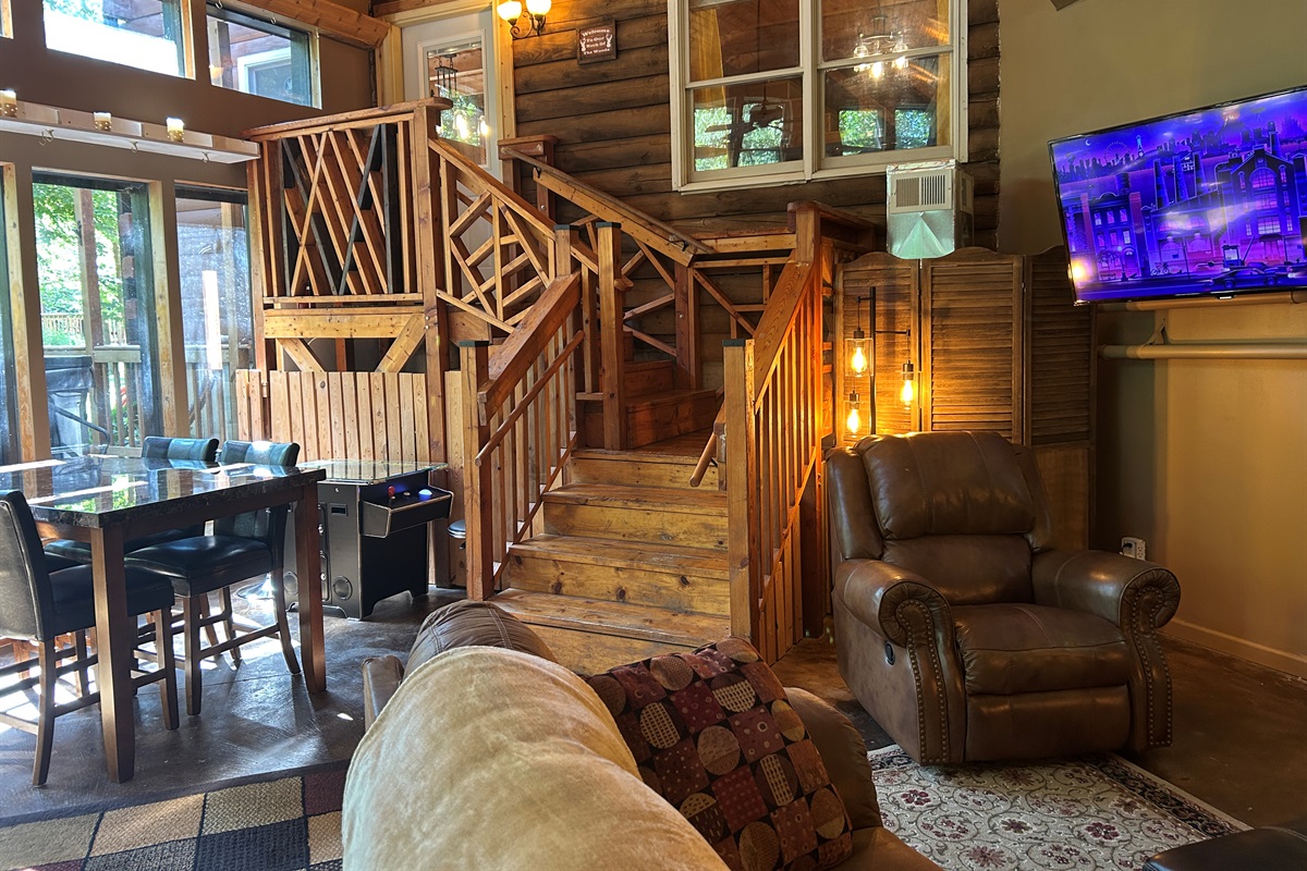 This climate controlled area is a nice gathering place between the Log Cabin and Guest Quarters. The entrance to the Log Cabin is at the top of the stairs.