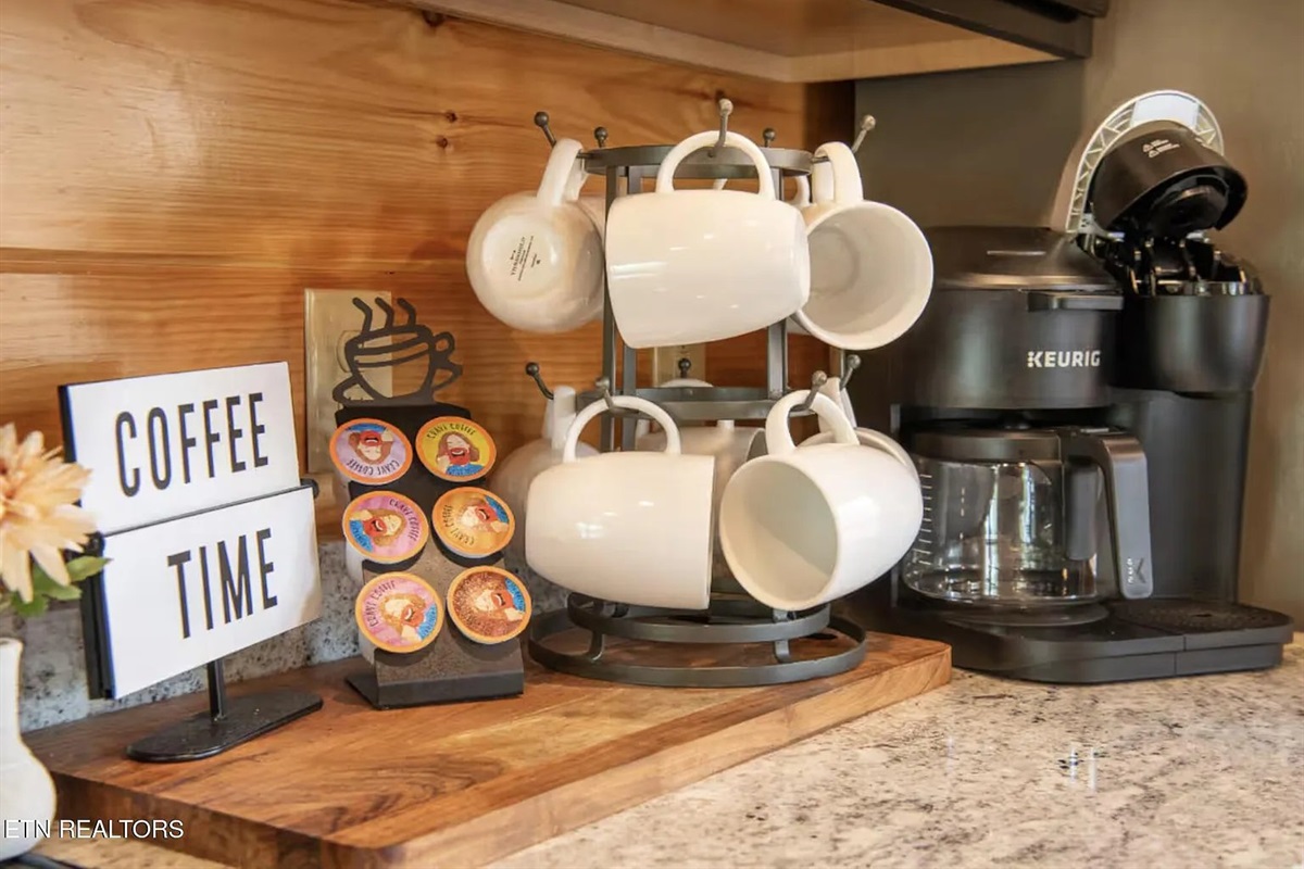 Start every morning right at the dedicated coffee station inside Marigold Cabin, a 3-bedroom, 3-bathroom rental in Pigeon Forge, TN. Stocked and ready for your group, this thoughtful touch is just one of many premium amenities that make Marigold a top-rate