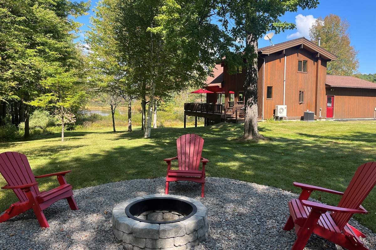 Firepit in the back yard at Hidden Creek Lodge