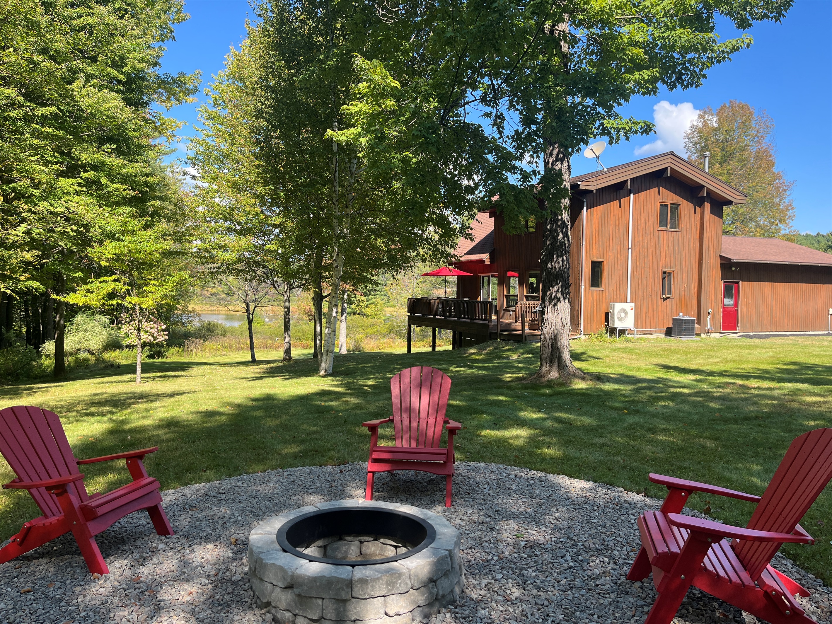 Firepit in the back yard at Hidden Creek Lodge