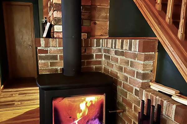 Cozy up by our modern wood stove.