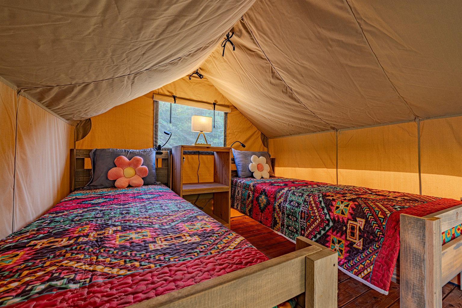 Leo sleeps 2 in single beds and has a mini split for all season comfort.