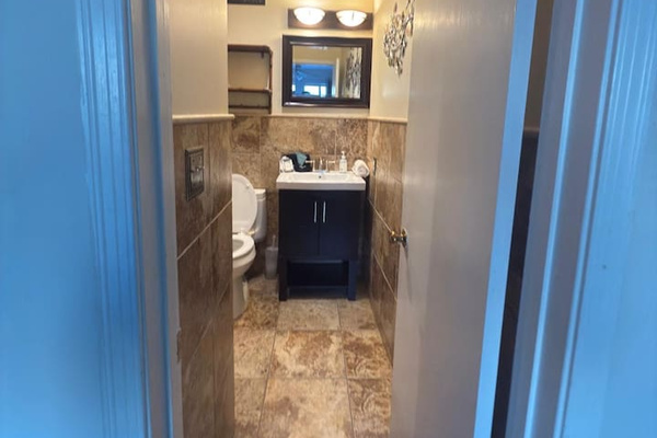 Bathroom with tiled walls