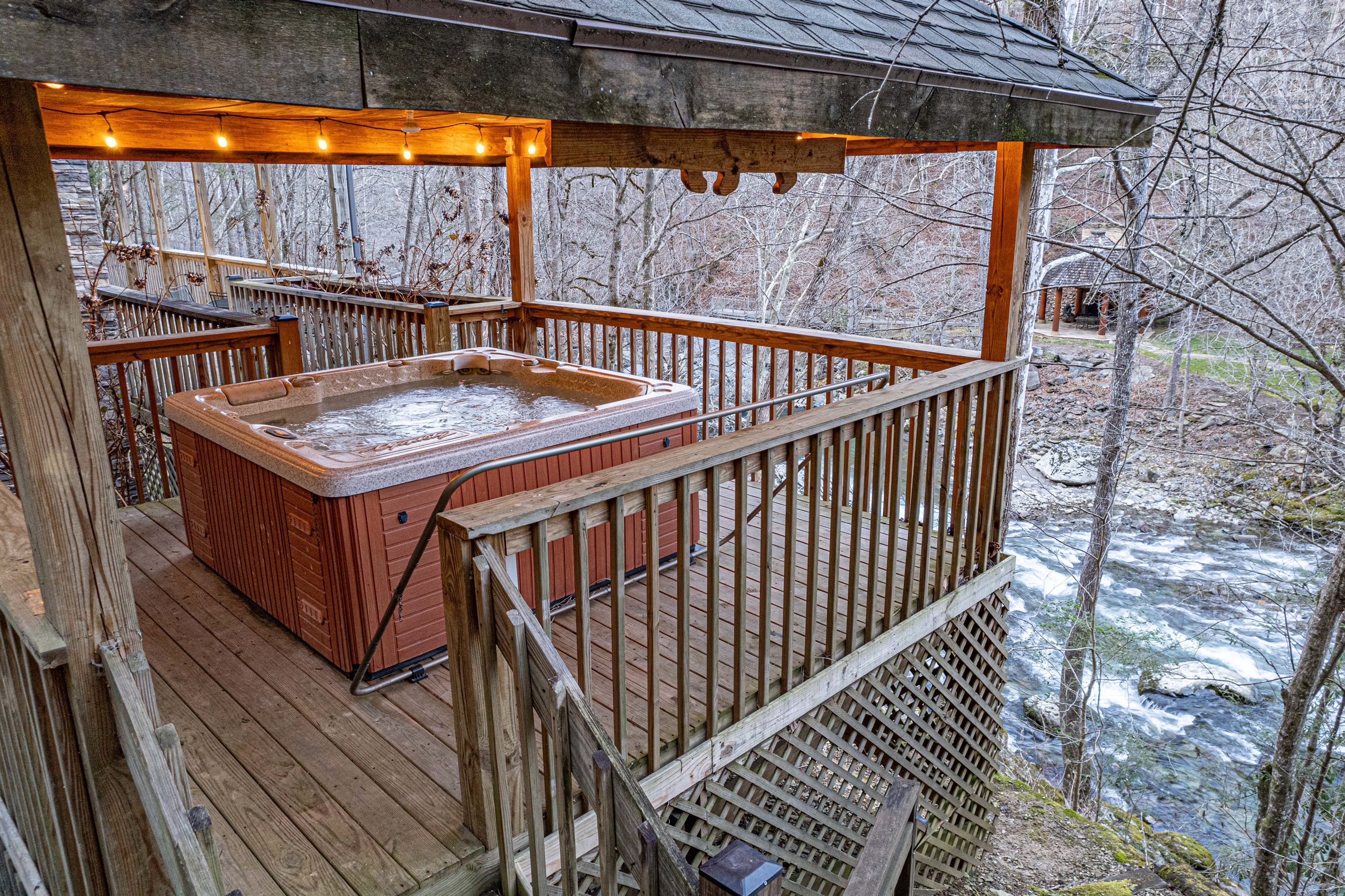 Unwind in the private hot tub gazebo, complete with serene views. Secluded and intimate—perfect for melting into relaxation after a day on the town.