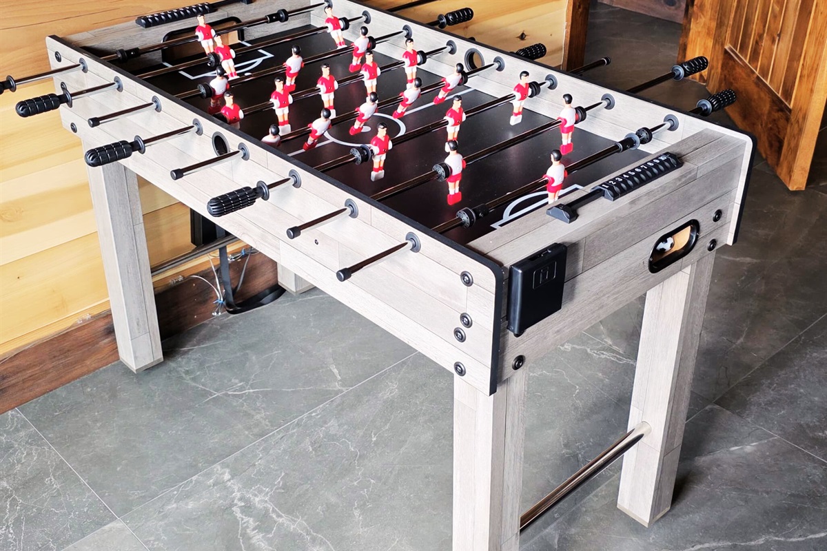 Family fun starts with a round of foosball in the game room. A perfect spot for friendly competition and laughs.