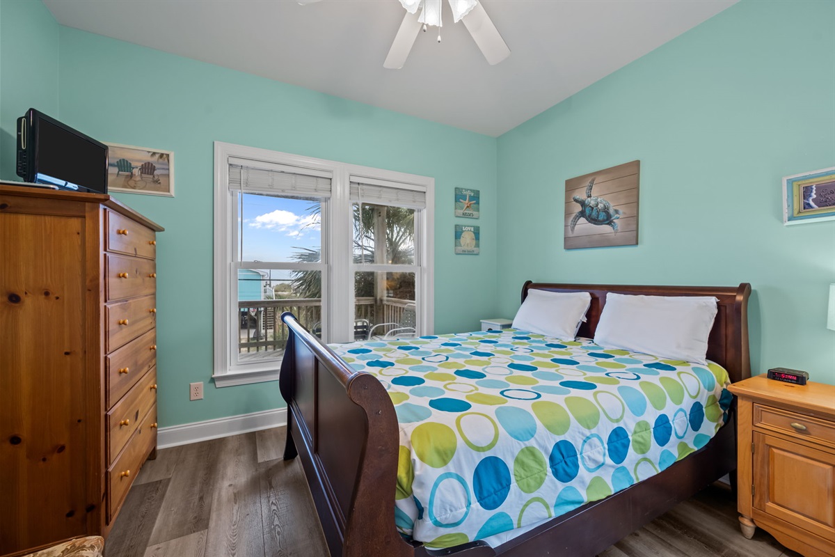 Queen-size bed in 1st Floor Bedroom #2