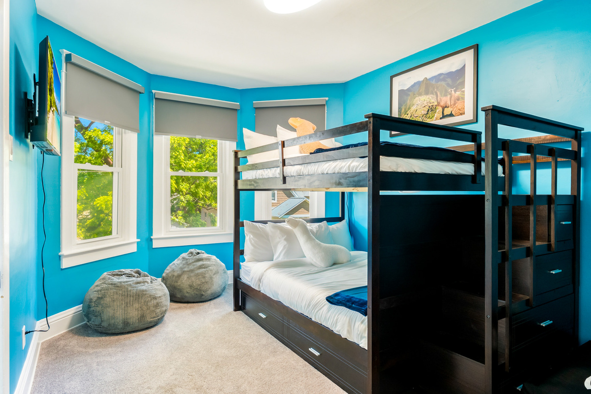 Kid headquarters! The legendary Machu Picchu bunk room features two full beds, a twin bunk, and a pull-out twin trundle—sleeping up to 6 guests in absolute comfort.