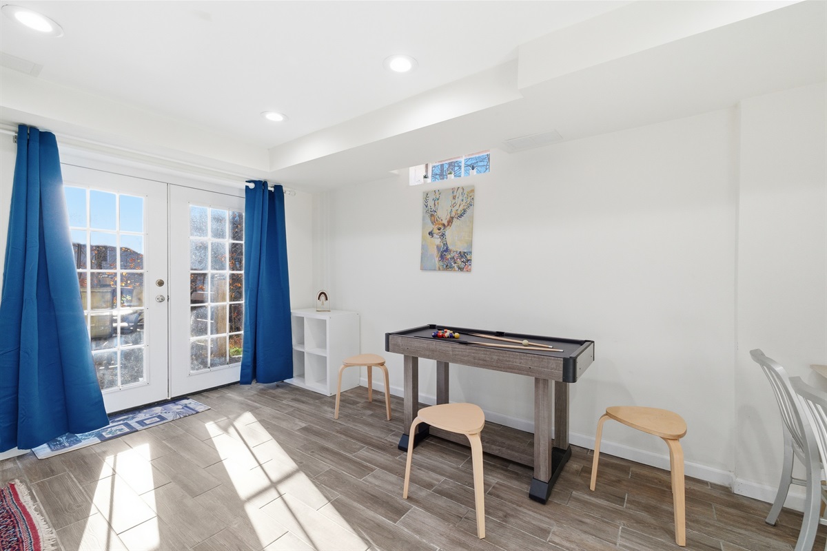Lower level with Smart TV, PlayStation 5, foosball, mini pool table