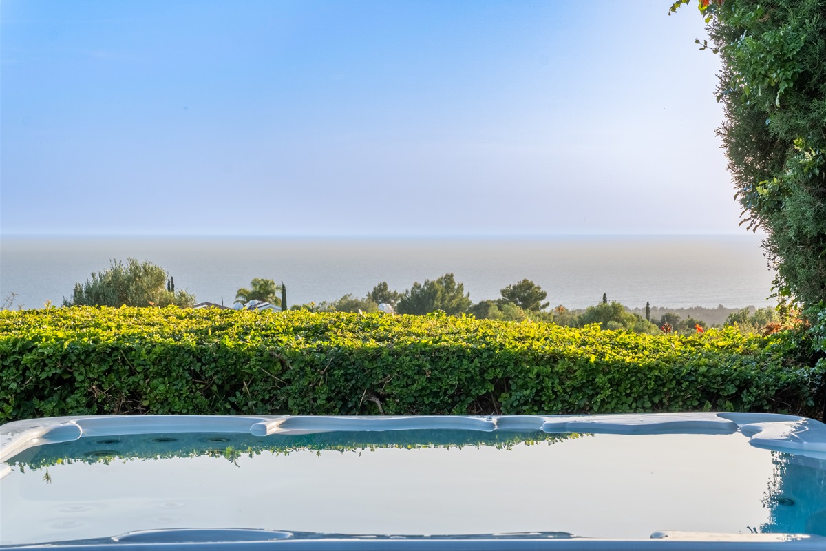 Take in breathtaking views of the sea while soaking in the outdoor hot tub, large enough to fit six people.